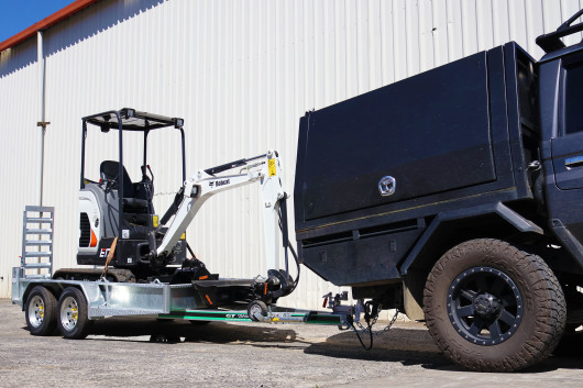 Bobcat E17Z on a trailer Tilt Dig and Spade Bucket